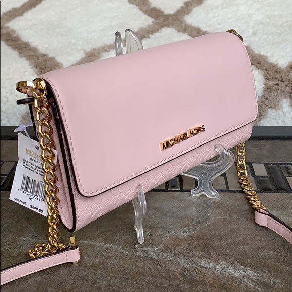 Michael Kors Handbags - MICHAEL KORS JET SET ITEM LG WALLET ON A CHAIN